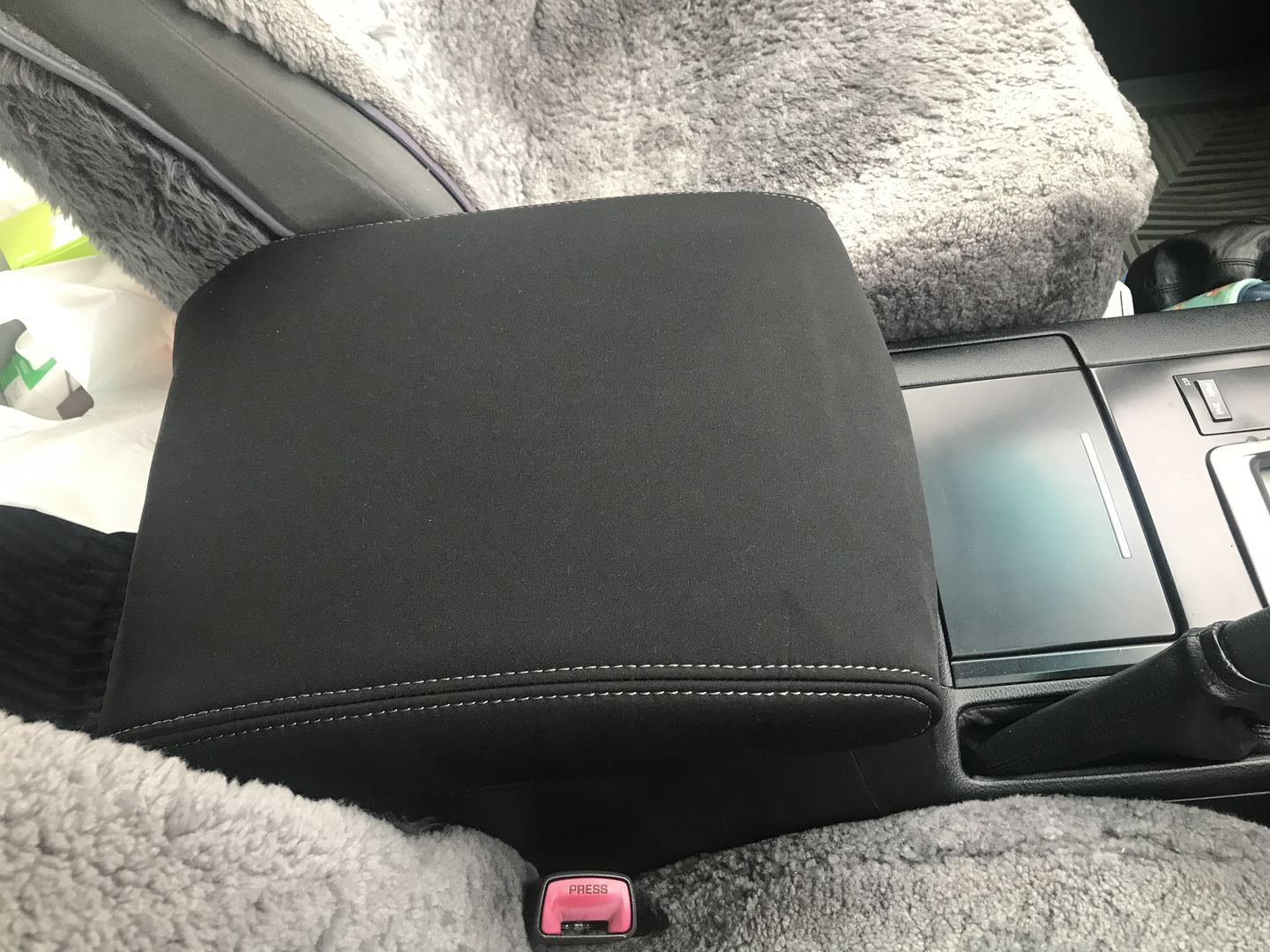 Customer photo review of Toyota Landcruiser 200 Series Neoprene Armrest Console Lid (In Stock)