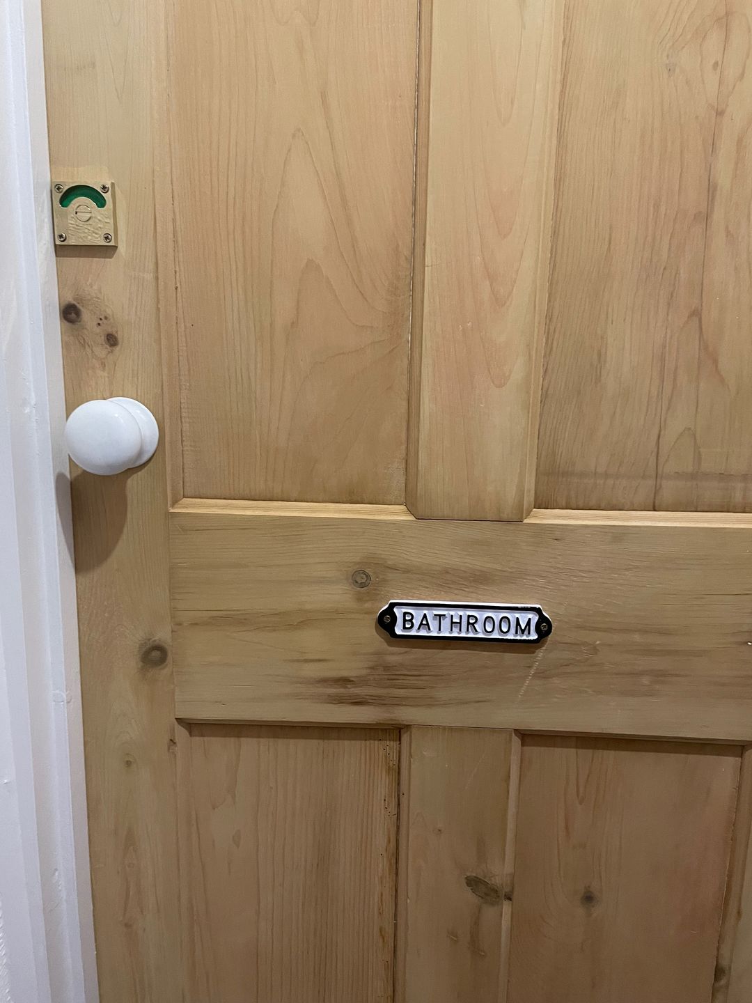 Customer photo review of Bathroom Door Sign