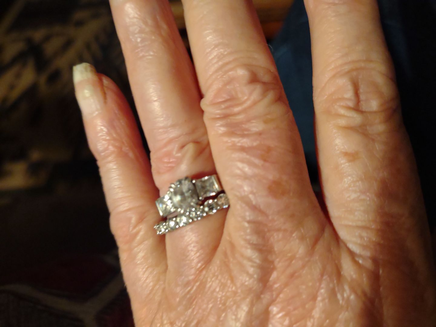 Customer photo review of Round Moissanite Sterling Silver Wedding Band Stackable Ring
