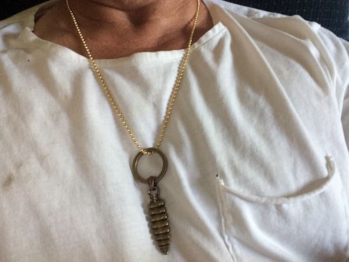 Customer photo review of Brass Rattlesnake Tail Pendant