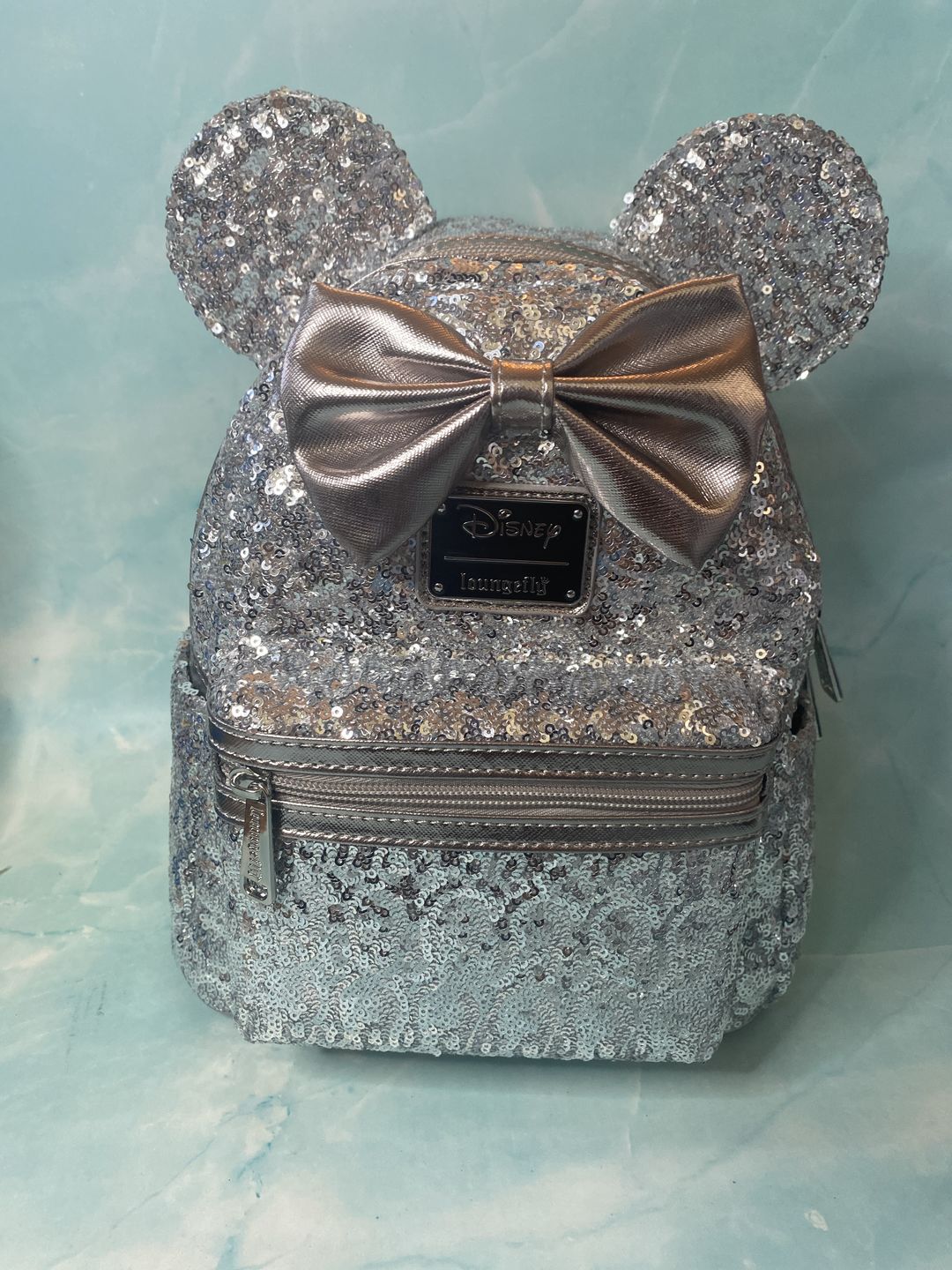 Customer photo review of 707 Street Exclusive - Loungefly Disney Minnie Mouse Silver Sequin Mini Backpack
