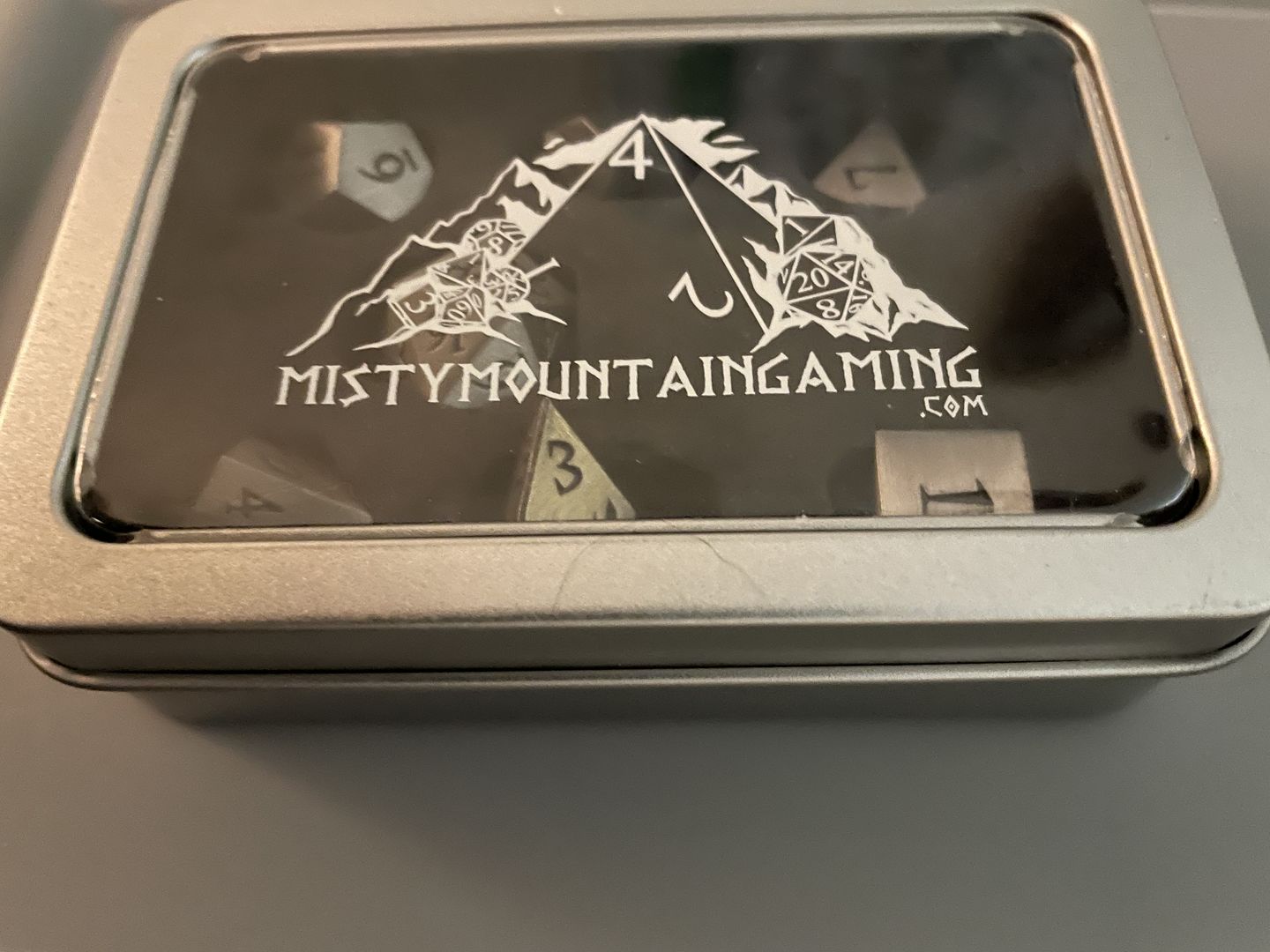 Customer photo review of BRUSHED SILVER SHARP-EDGED METAL DICE