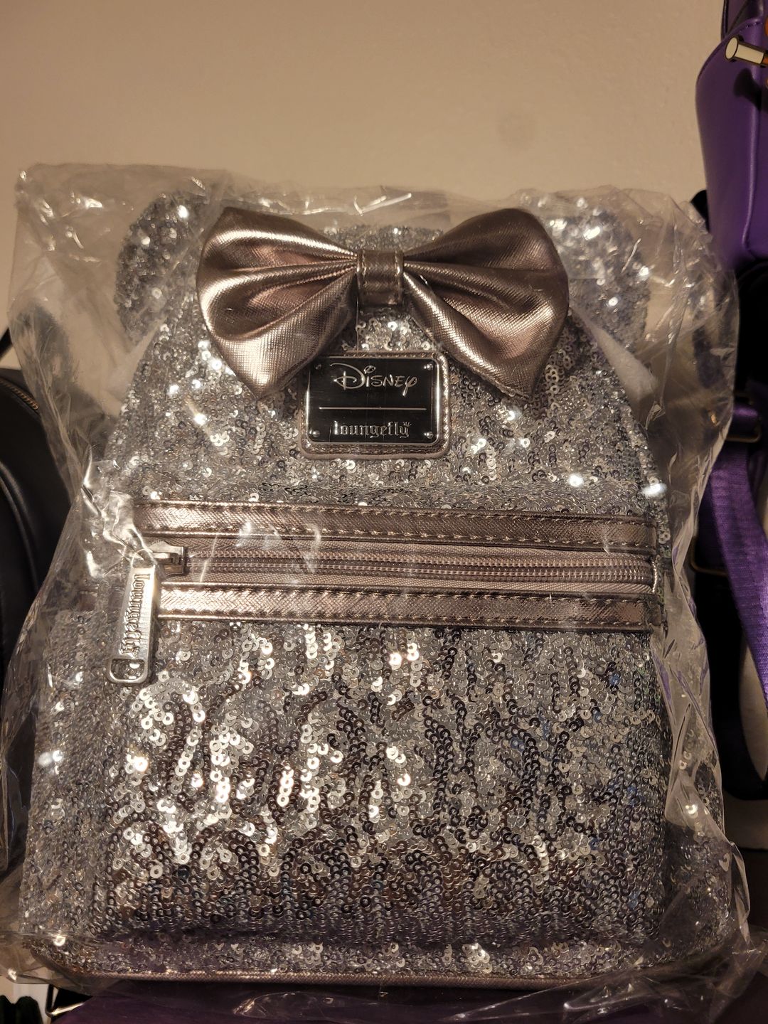 Customer photo review of 707 Street Exclusive - Loungefly Disney Minnie Mouse Silver Sequin Mini Backpack