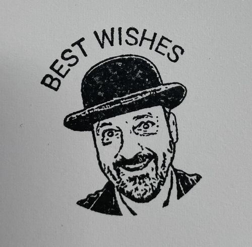 Customer photo review of Wooden Handle Face Stamp