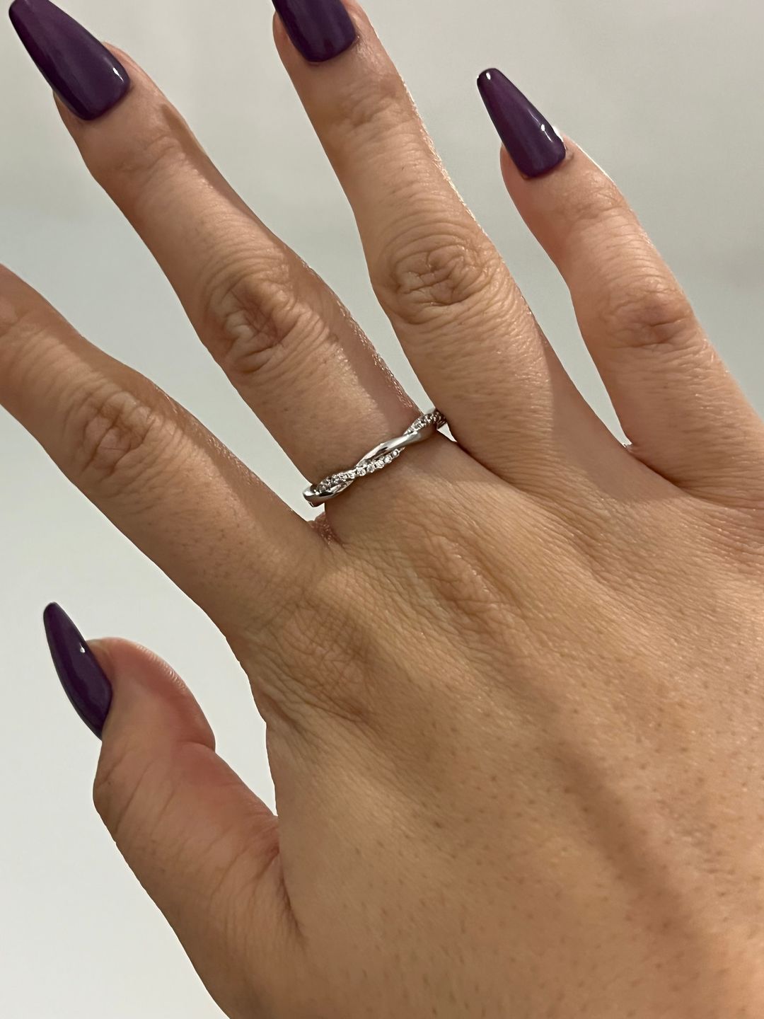 Customer photo review of Louily Twist Eternity Wedding Band for Women In Sterling Silver