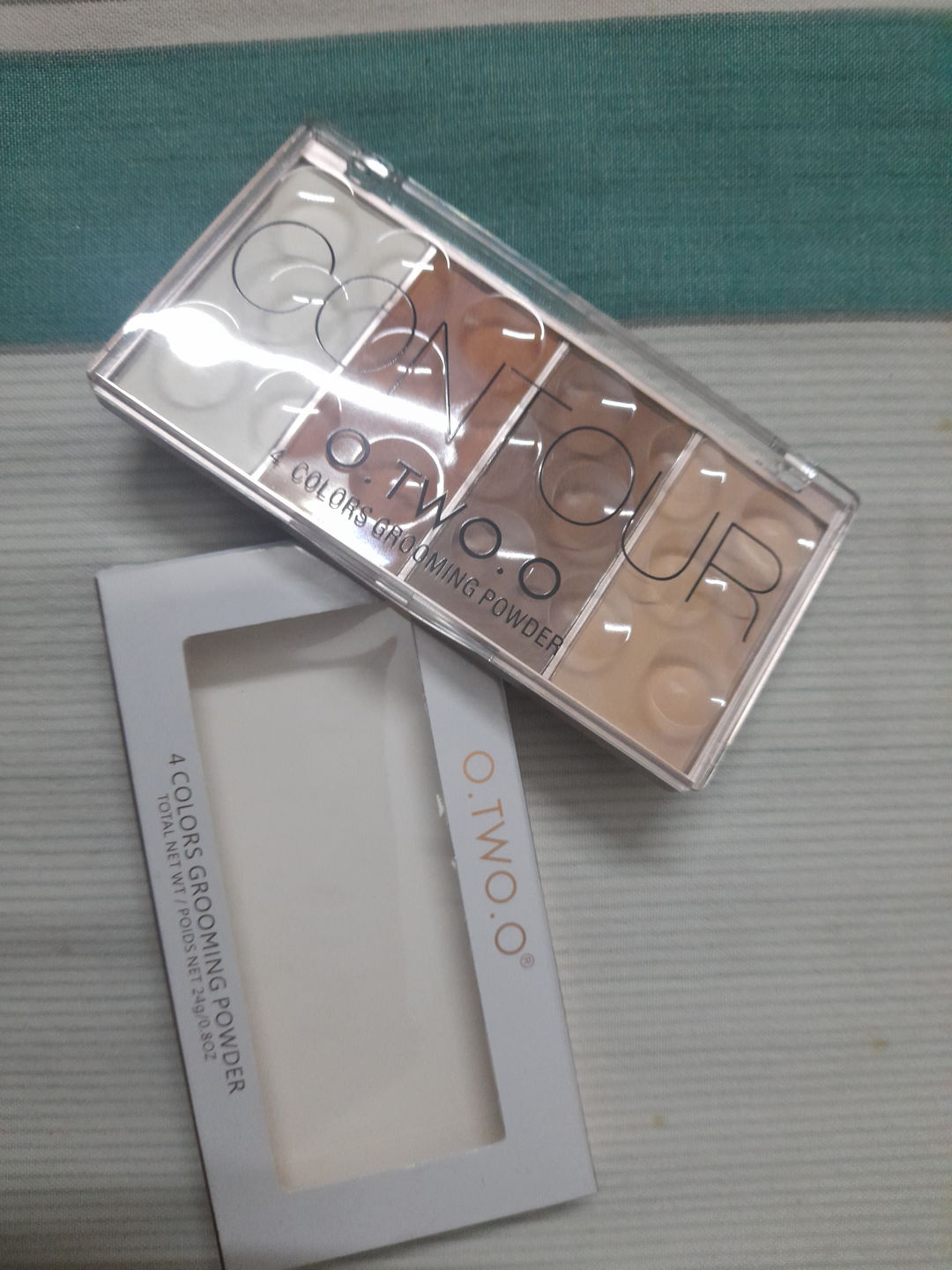 Customer photo review of O.TWO.O 4 COLORS GROOMING POWDER