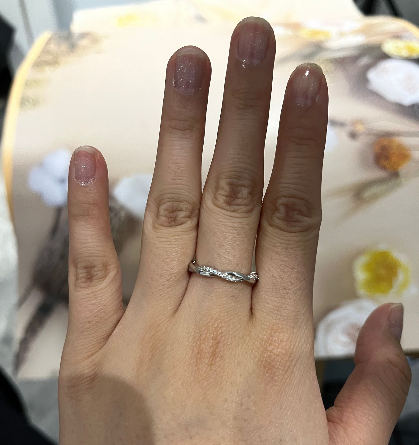 Customer photo review of Louily Twist Eternity Wedding Band for Women In Sterling Silver