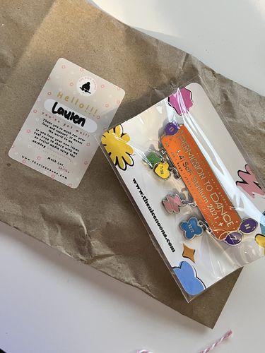 Customer photo review of BTS Permission To Dance LA Concert Enamel Pins