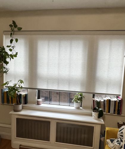 Customer photo review of SmartWings Motorized Light Filtering Roller Shades 70% Blackout Linen