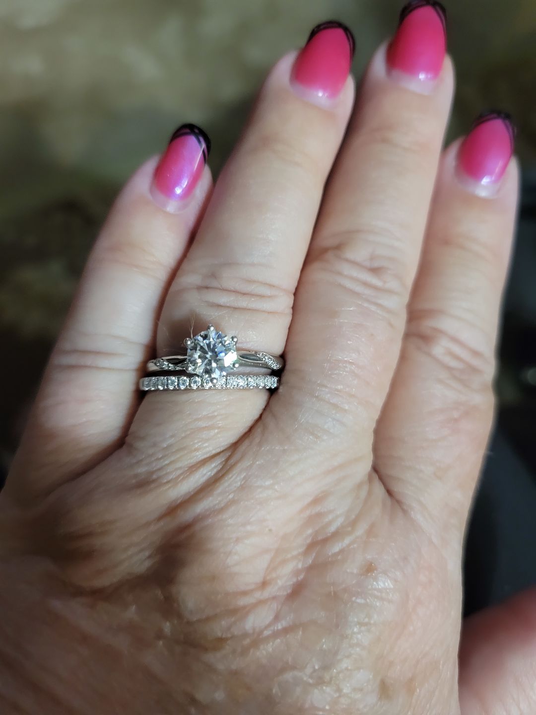Customer photo review of Moissanite Round Half Eternity Sterling Silver Wedding Band Stackable Ring