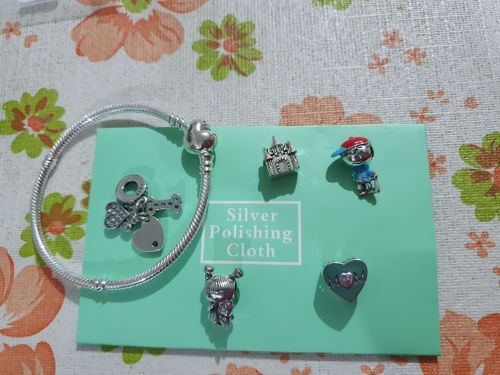 Customer photo review of 925 Sterling Silver Little Girl with Unicorn Charm