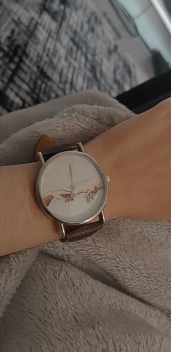 Customer photo review of Creation of Adam Watch