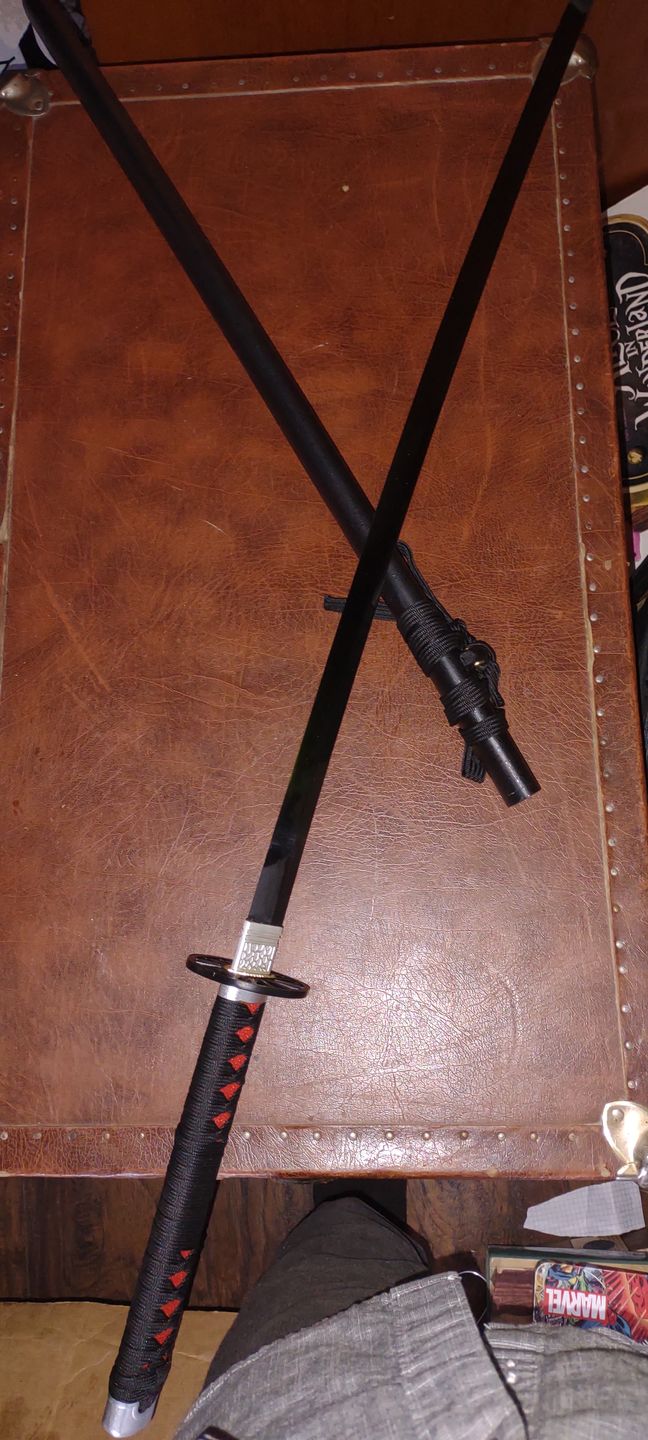 Customer photo review of The Tanjiro Handmade Katana T10 Steel Clay Tempered From Demon Slayer