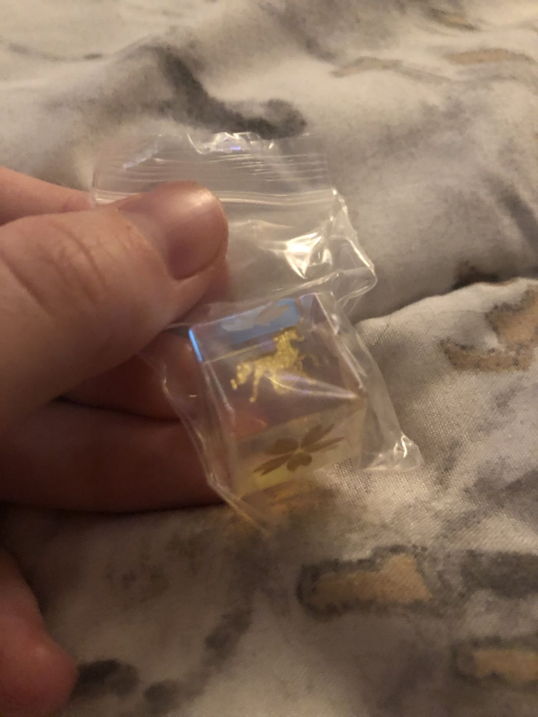 Customer photo review of URWizards D&D Dichroic Prism  Glass Engraved Dice Set Unicorn Style