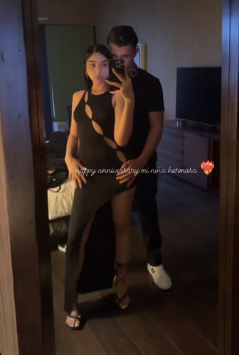 Customer photo review of Sleeveless hollow out high slit maxi dress