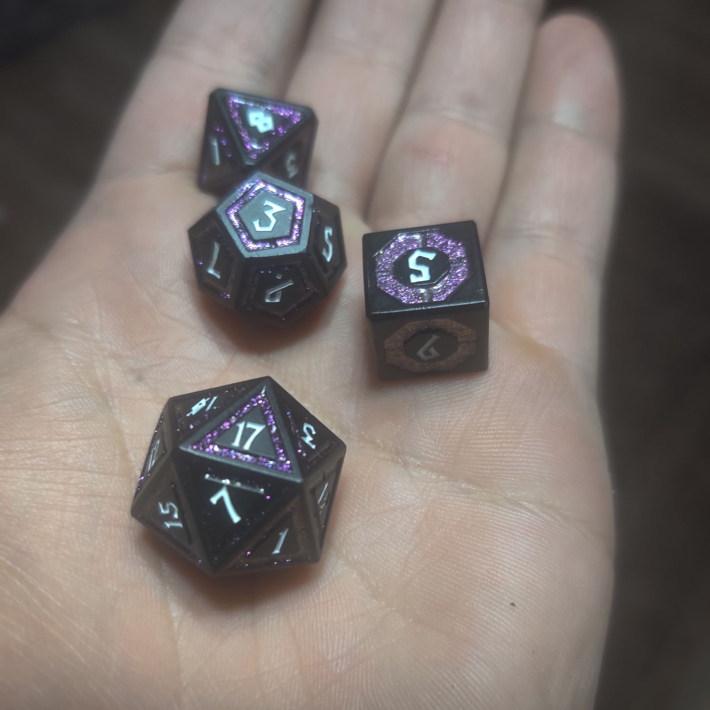 Customer photo review of CLERIC'S SHADOW DOMAIN PURPLE AND MATTE BLACK METAL DICE