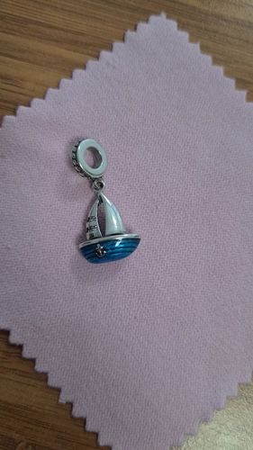 Customer photo review of 925 Sterling Silver Sailing Boat Charm