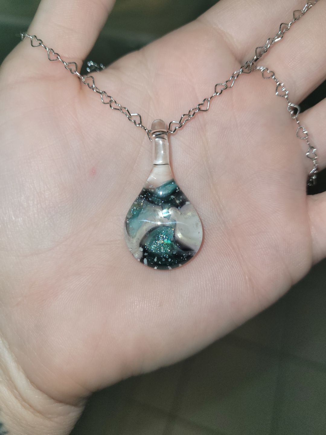 Customer photo review of Ocean Crash Pendant with Infused Cremation Ashes