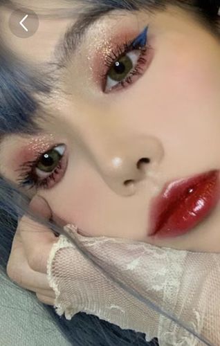 Customer photo review of DNA Taylor Green Colored Contact Lenses