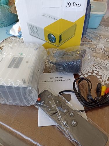 Customer photo review of FlixBox® - The #1 Mini Pocket Projector