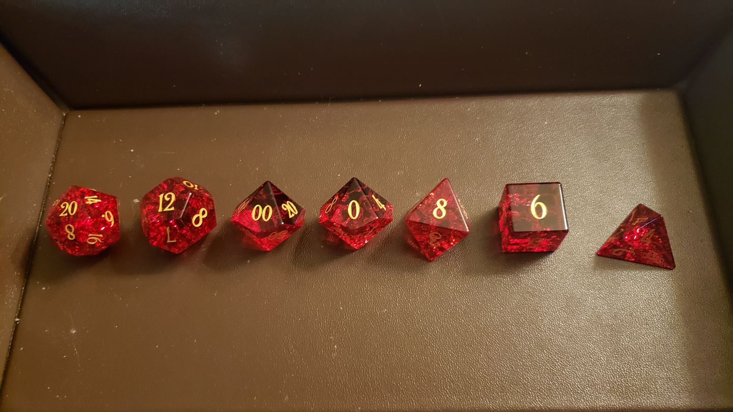 Customer photo review of URWizards D&D Blast Red Glass Engraved Dice Set
