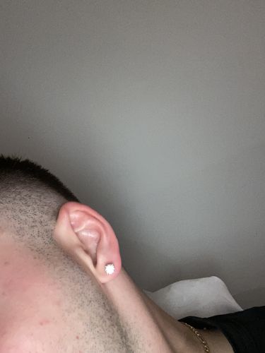 Customer photo review of VVS Moissanite Solitaire Stud Earrings