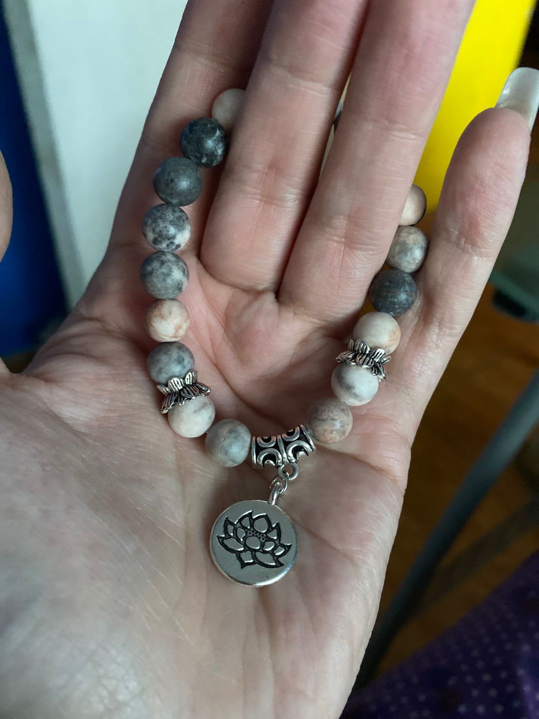 Customer photo review of Bracelet Bouddhiste et la Fleur de Lotus Porte-Chance