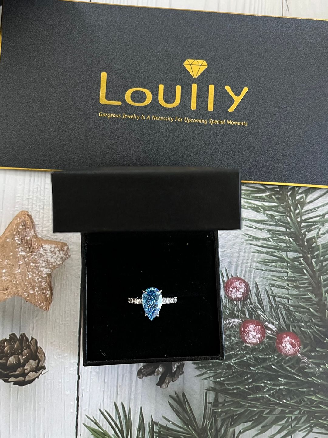 Customer photo review of Louily Unique 3.0 Carat Pear Cut Blue Sapphire Engagement Ring In Sterling Silver