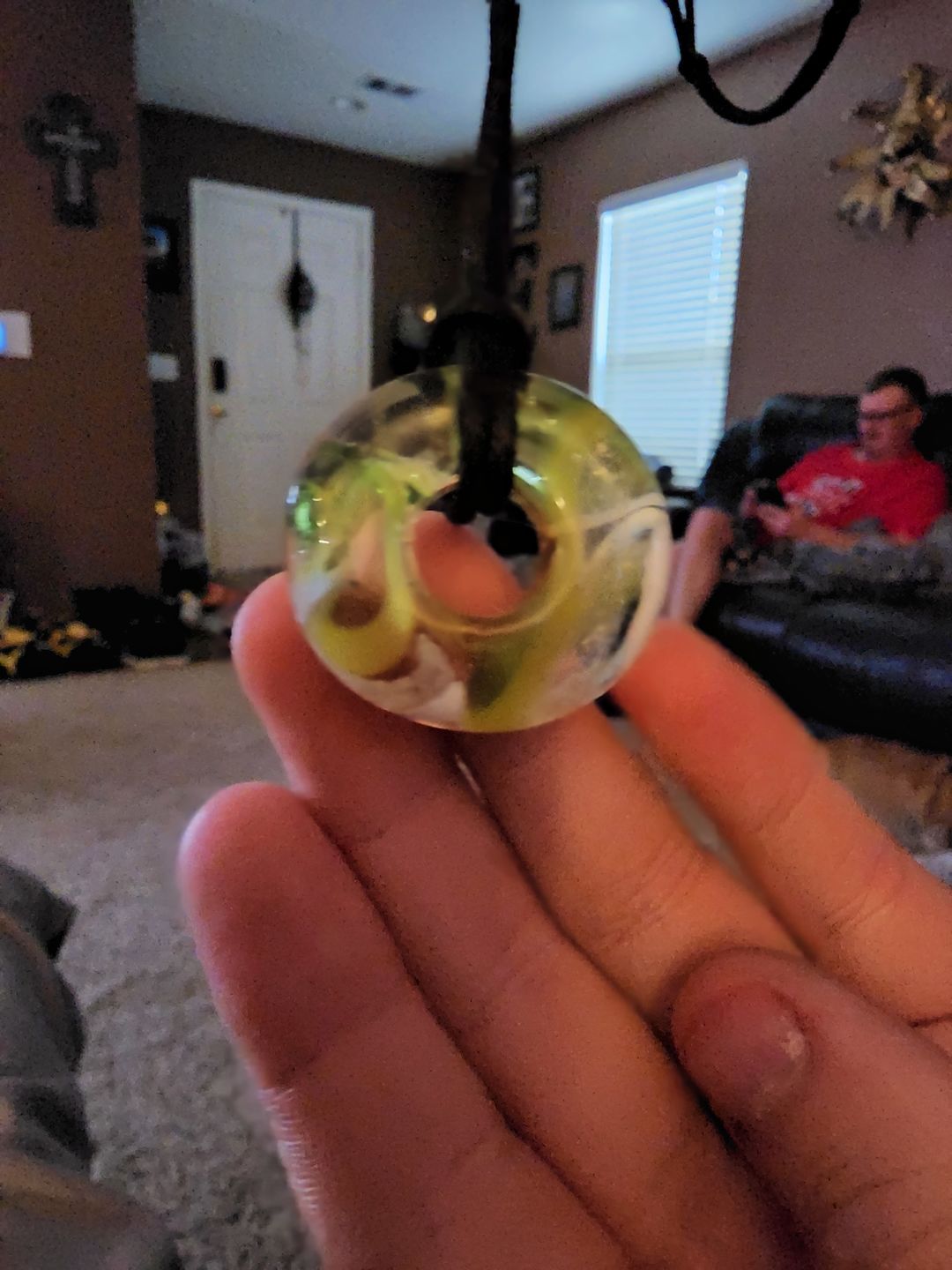Customer photo review of Taffy Confetti Halo Pendant with Infused Cremation Ashes