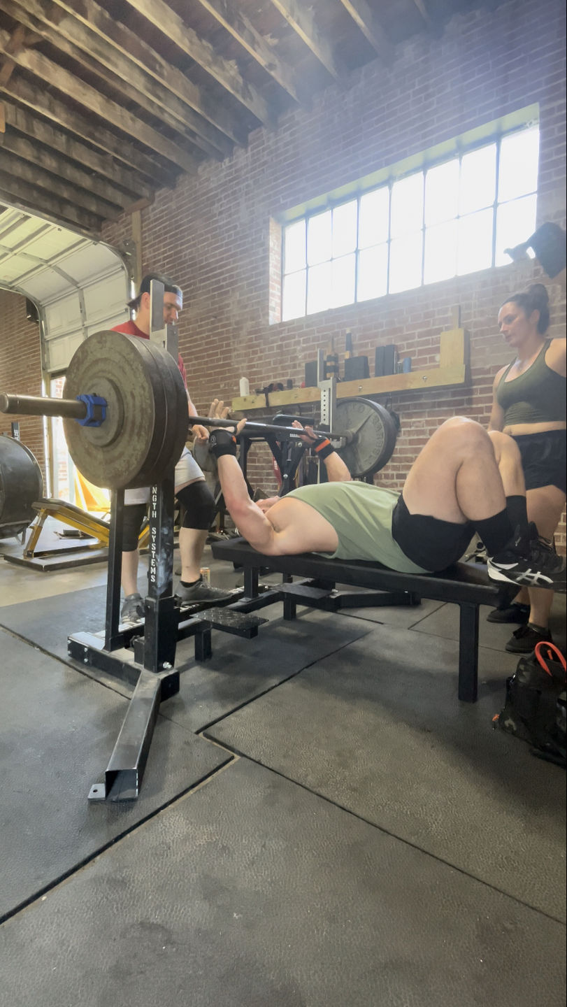 Customer photo review of Strength Shop Stiff Wrist Wraps - Black/Orange - IPF Approved