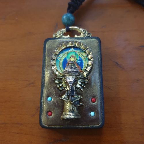Customer photo review of FREE Today:  Mysterious God of Wealth Buddha Necklace