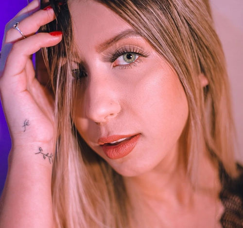 Customer photo review of DNA Taylor Blue Gray Colored Contact Lenses