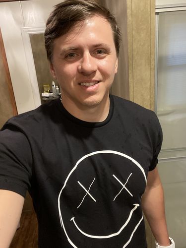 Customer photo review of Salty Savage Unisex OG Smile Tee | In Your Face Edition | Black
