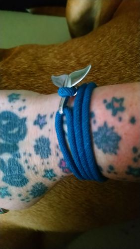 Customer photo review of "Whale" tracking bracelet