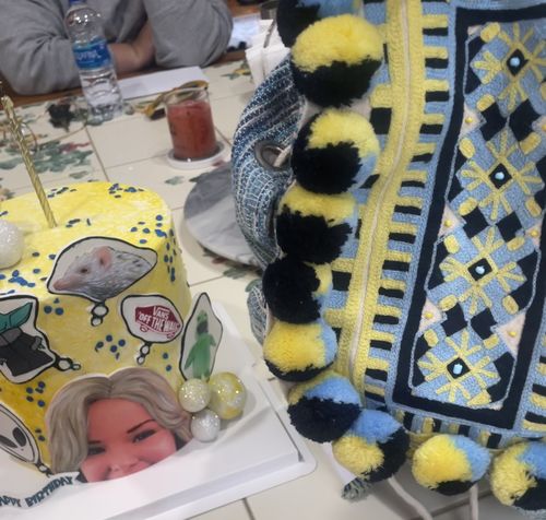 Customer photo review of Geo Embroidered Backpack With Pompoms