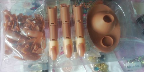 Customer photo review of Dedo Articulado con 100 Repuestos