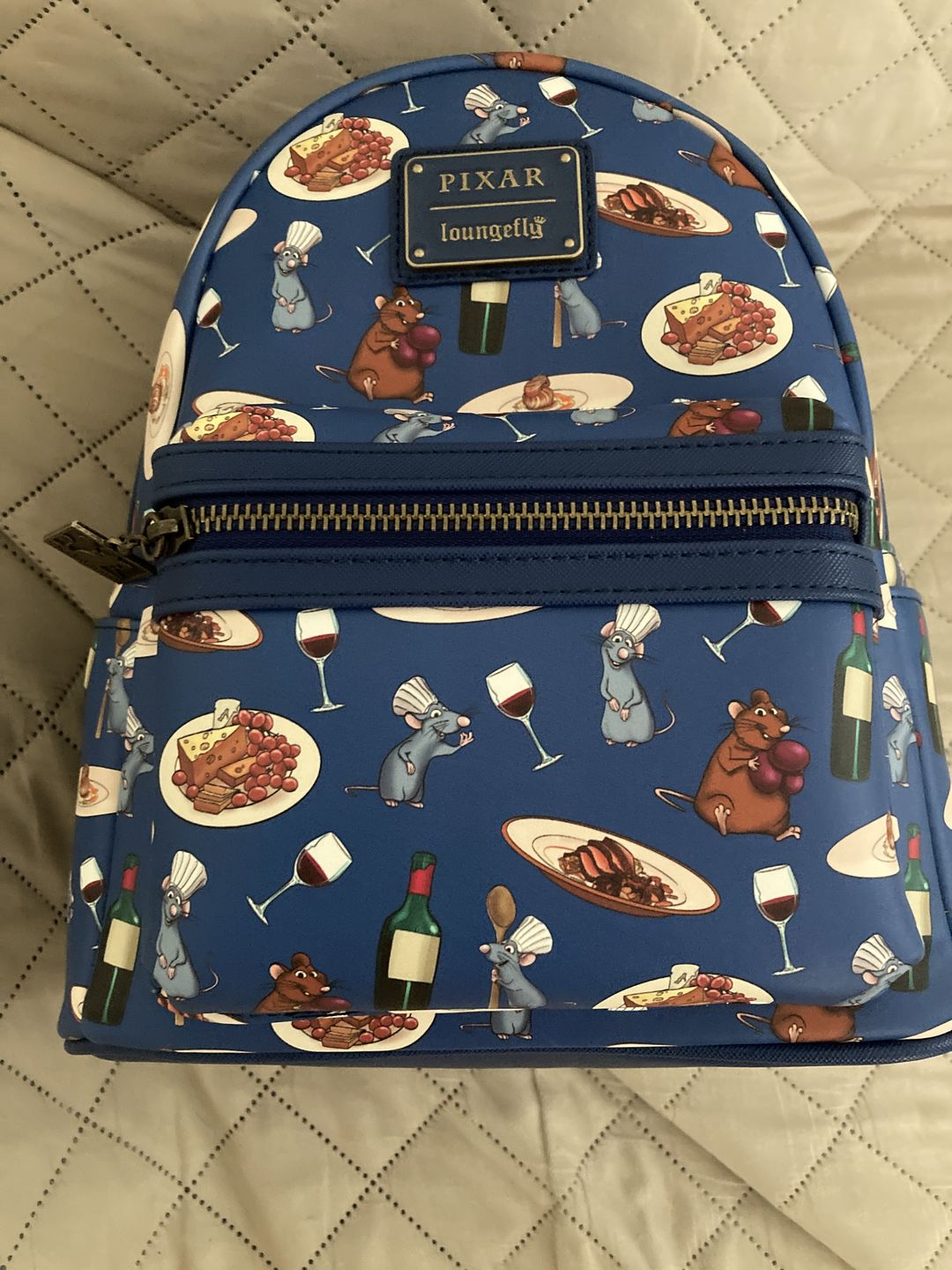 Customer photo review of 707 Street Exclusive -  Loungefly Disney Pixar Ratatouille Remy and Emile Allover Print Mini Backpack