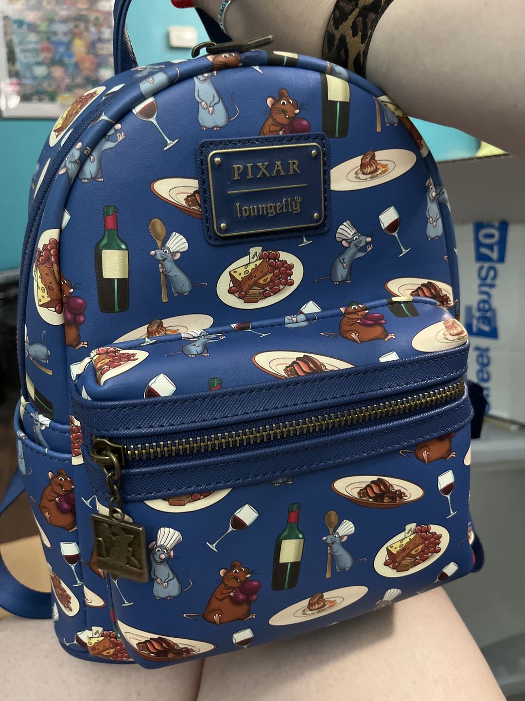 Customer photo review of 707 Street Exclusive -  Loungefly Disney Pixar Ratatouille Remy and Emile Allover Print Mini Backpack