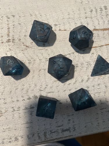Customer photo review of Raised Dark Blue Lightning Glass DnD Dice Set Moon Dice