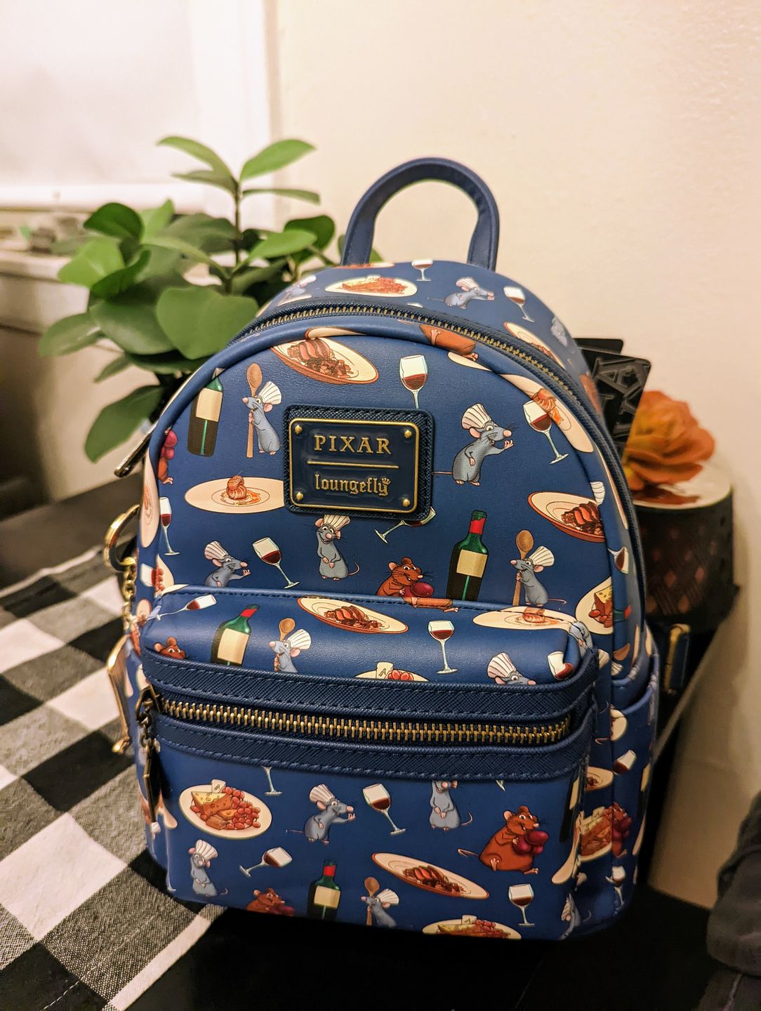 Customer photo review of 707 Street Exclusive -  Loungefly Disney Pixar Ratatouille Remy and Emile Allover Print Mini Backpack