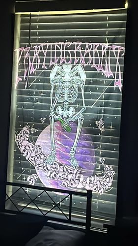 Customer photo review of Sad Rabbit Tapestry 55"