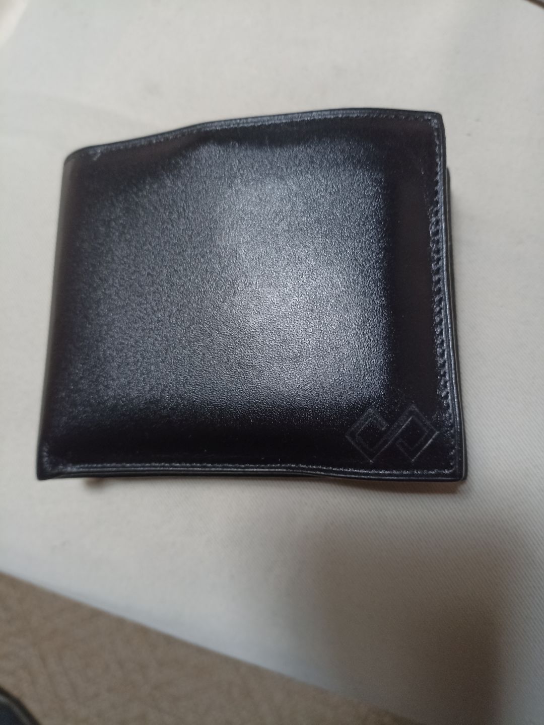 Customer photo review of Billetera Clásica