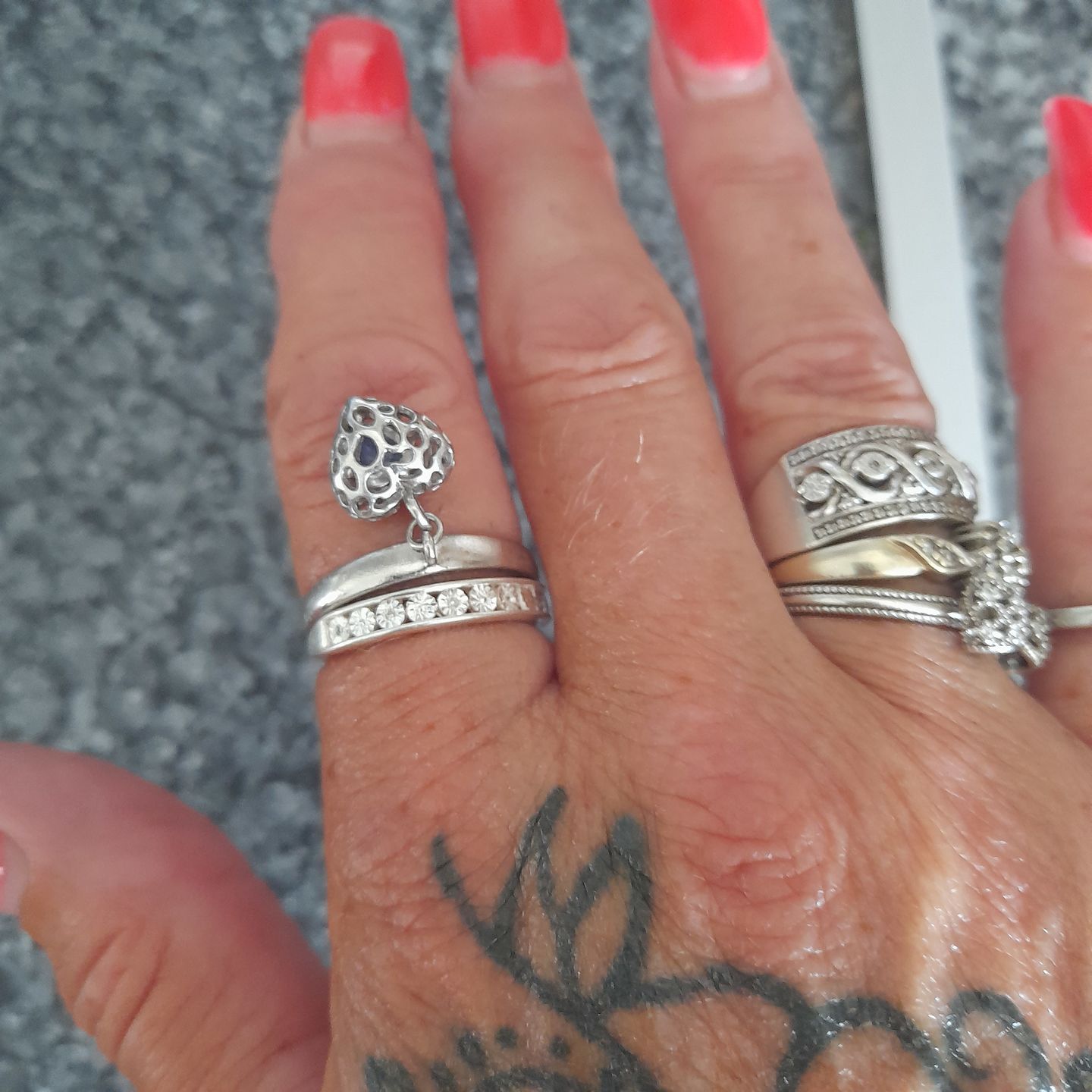 Customer photo review of Angel Heart Charm Ring with Tanzanite