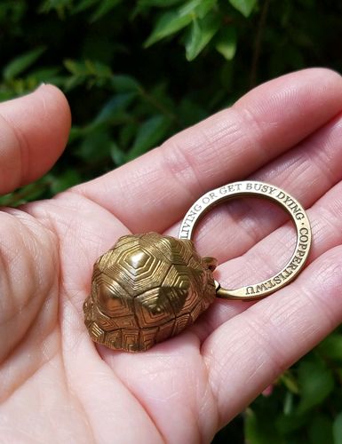 Customer photo review of Brass Tortoise Bell Pendant