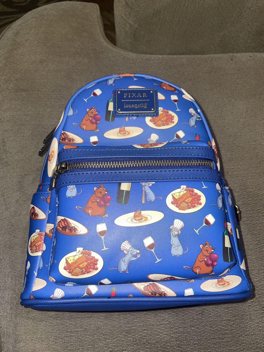 Customer photo review of 707 Street Exclusive -  Loungefly Disney Pixar Ratatouille Remy and Emile Allover Print Mini Backpack