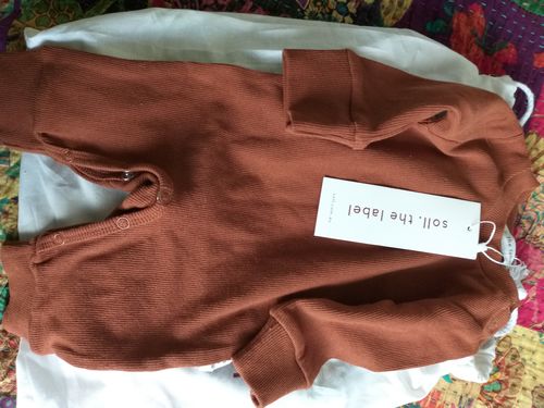 Customer photo review of Ribbed Long Sleeve Onesie - Rust