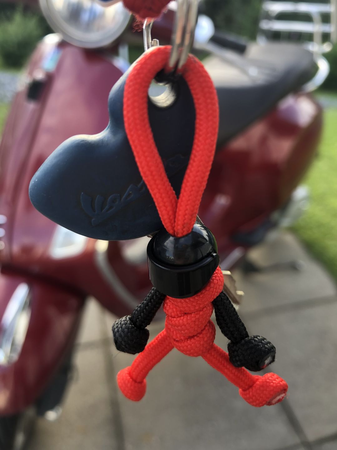 Customer photo review of Black Red Biker Buddy Paracord Keychain