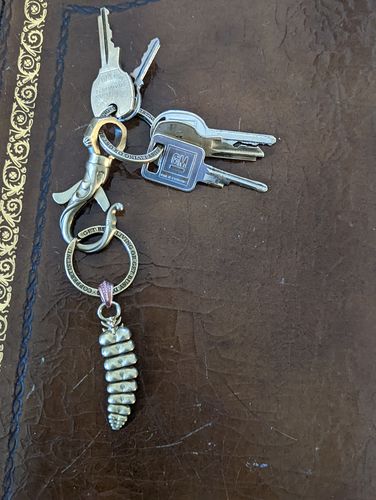 Customer photo review of Brass Rattlesnake Tail Pendant