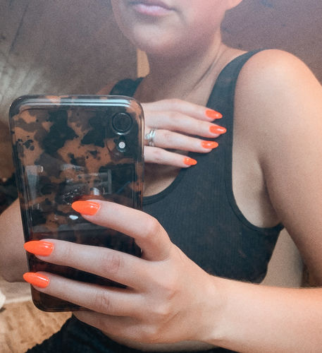 Customer photo review of Amber Leopard Marble iPhone Case