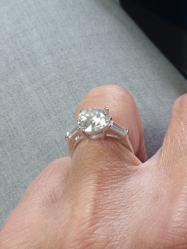 Customer photo review of Three Stone Round Moissanite Tapered Baguette Engagement Ring